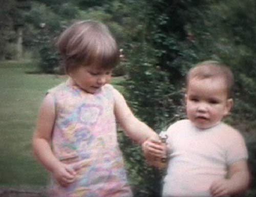 Alison aged 3 and David aged 18 months or so, playing in the garden of our grandparents' house in Winchester